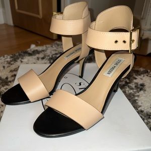 Woman’s Steve Madden strap heels